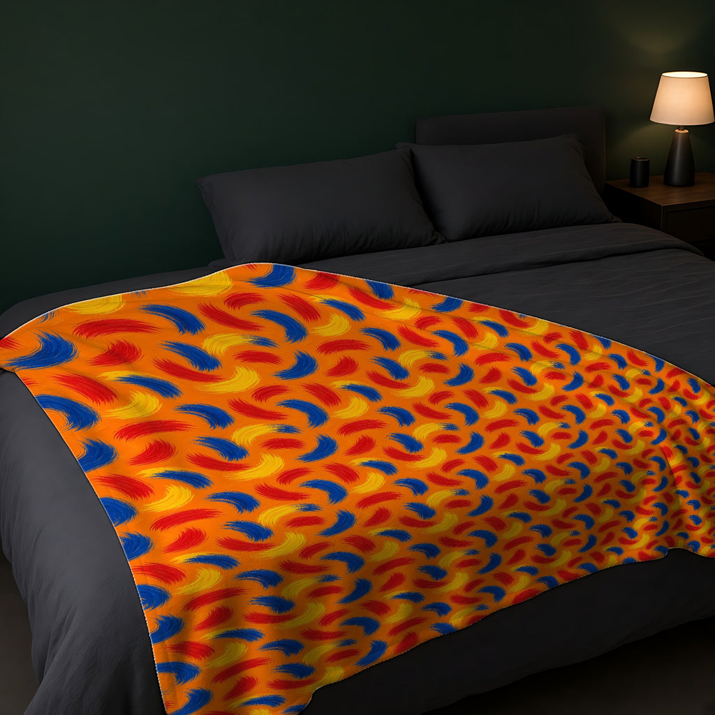Sweeping Arcs Sherpa Fleece Blanket across the foot of a dark bed