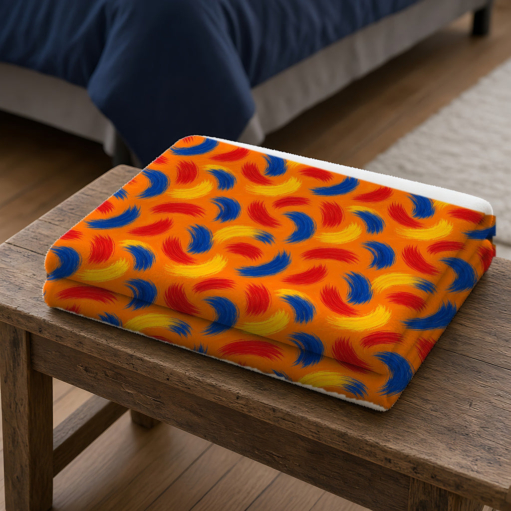 Sweeping Arcs Sherpa Fleece Blanket folded on a wooden bench