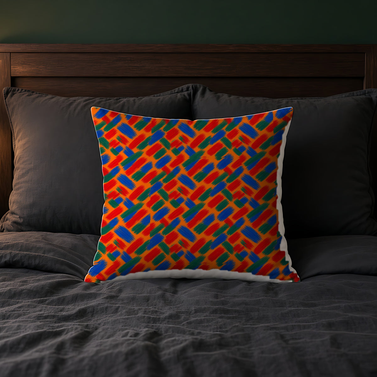 Flat Brush Bands Faux Suede Cushion on a bed with charcoal bedding