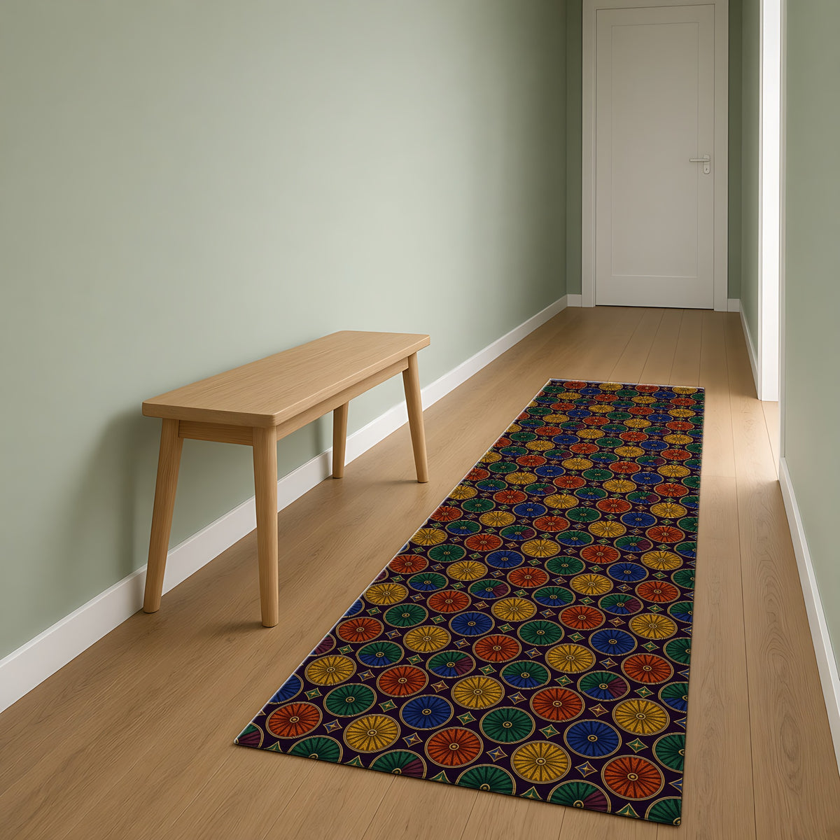 Enamel Parasol Medallions Outdoor Rug as a runner in a sage-green hallway