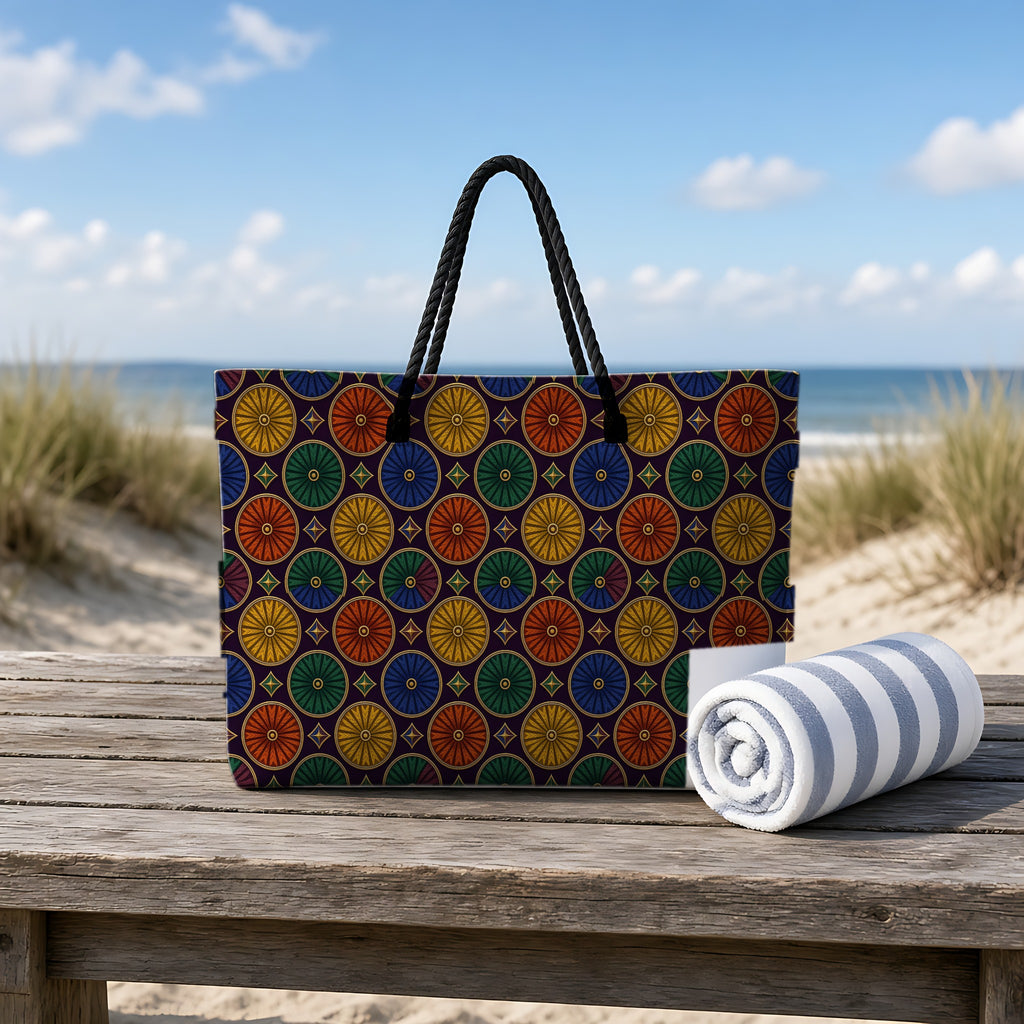 Enamel Parasol Medallions Weekender Tote Bag on a rustic table by the beach