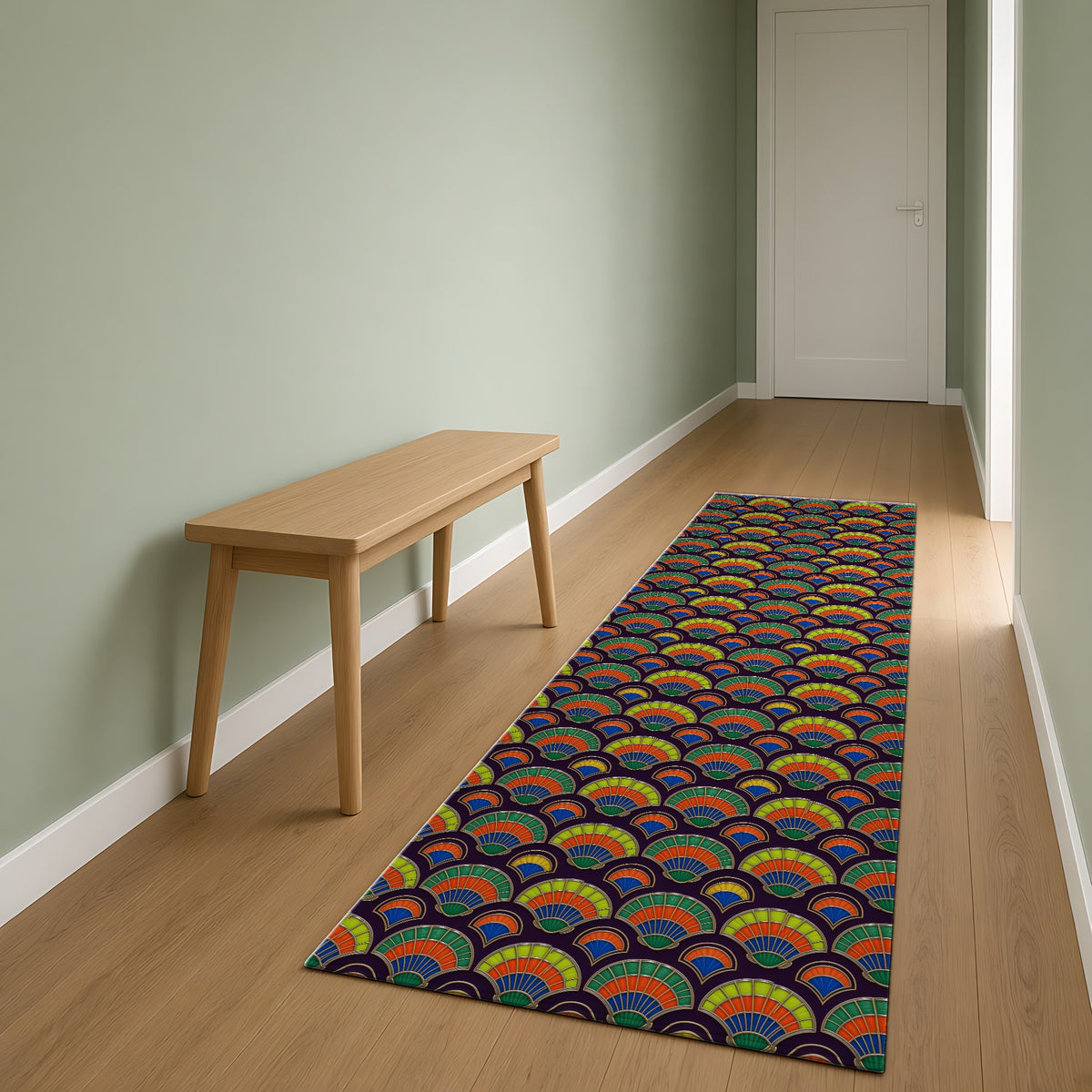 Deco Fan Scales Outdoor Rug as a runner in a sage-green hallway