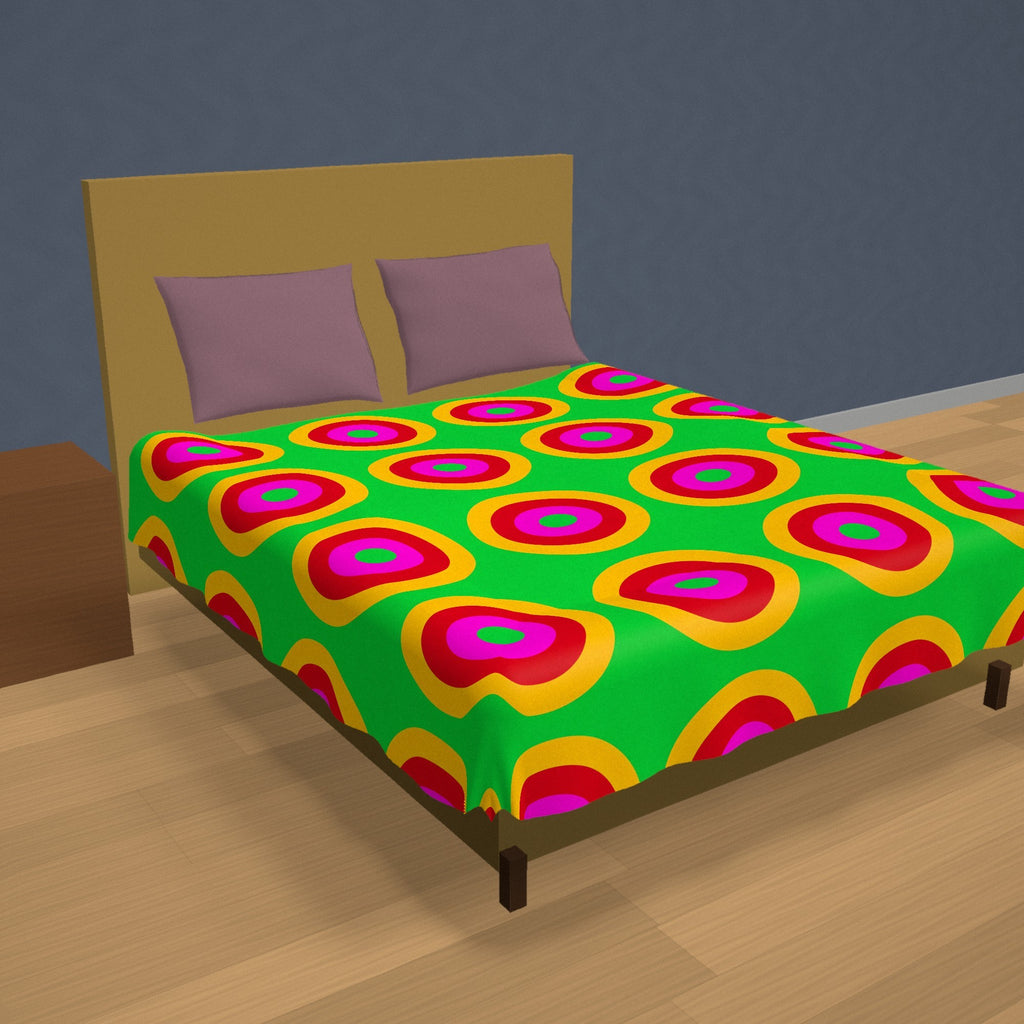 Giant Op-Art Jewel Rings Cotton Duvet Cover on a made bed