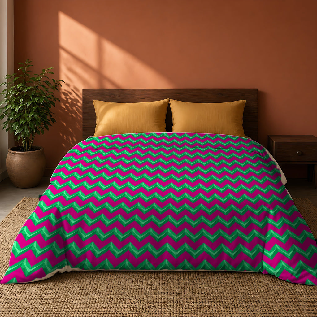 Broad Cut-Gem Chevrons Comforter on a king bed against a warm terracotta wall