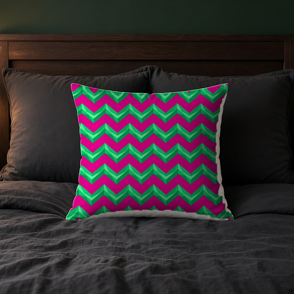 Broad Cut-Gem Chevrons Faux Suede Cushion on a bed with charcoal bedding