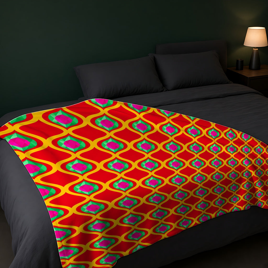 Grand Gold Ogee Lattice II Sherpa Fleece Blanket across the foot of a dark bed