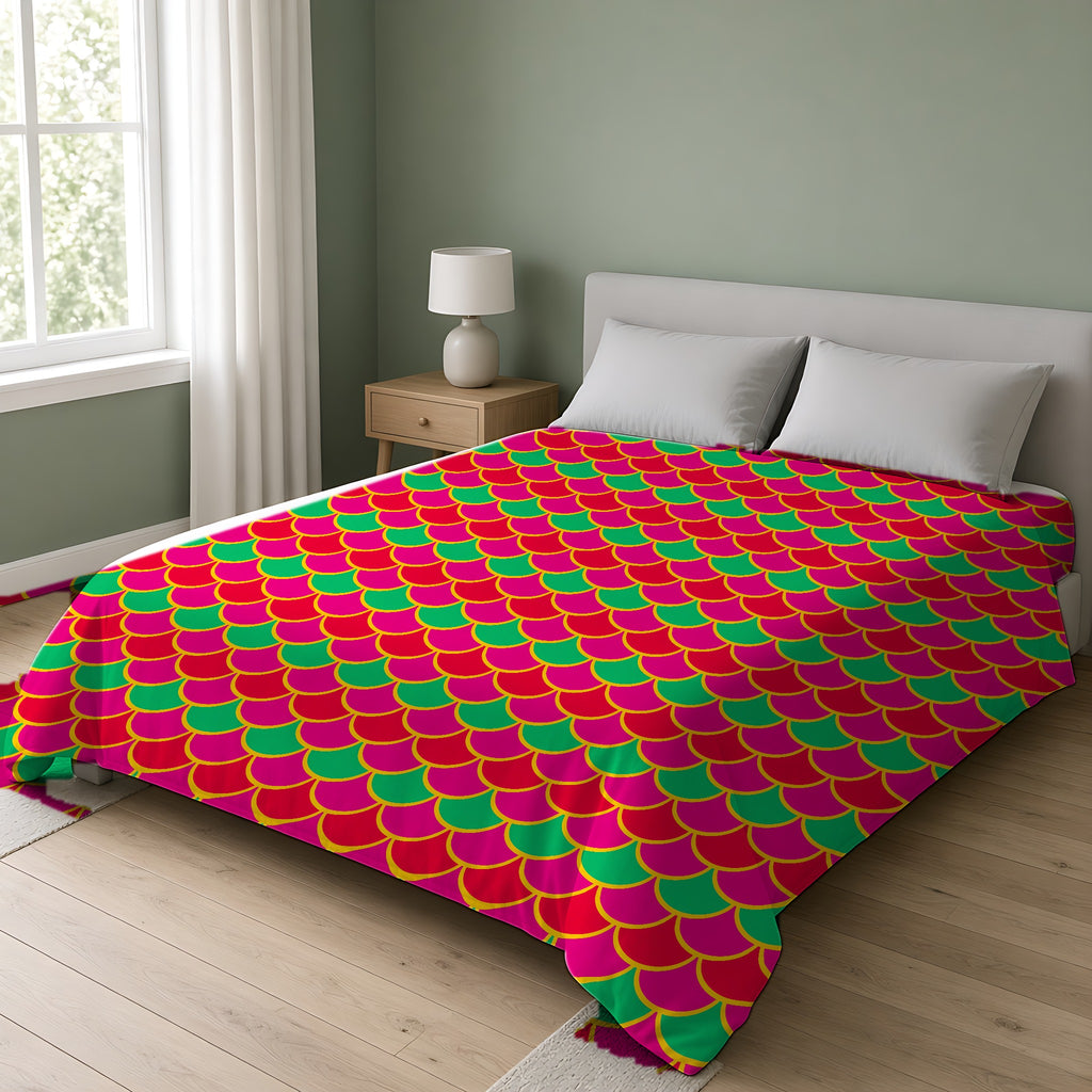 Big Jewel Scales II Comforter on a double bed in a bright sage-green bedroom