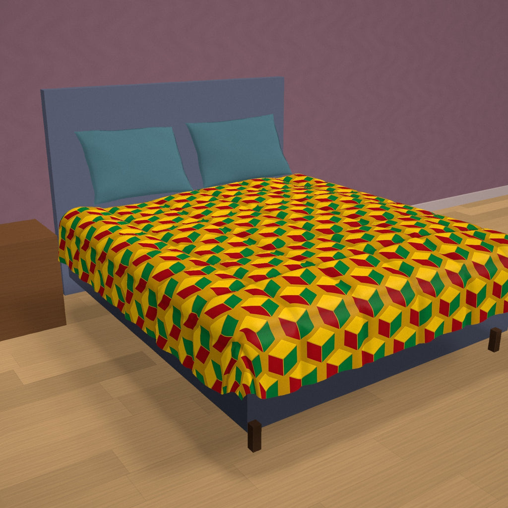 Giant Faceted Cubes II Comforter on a made bed