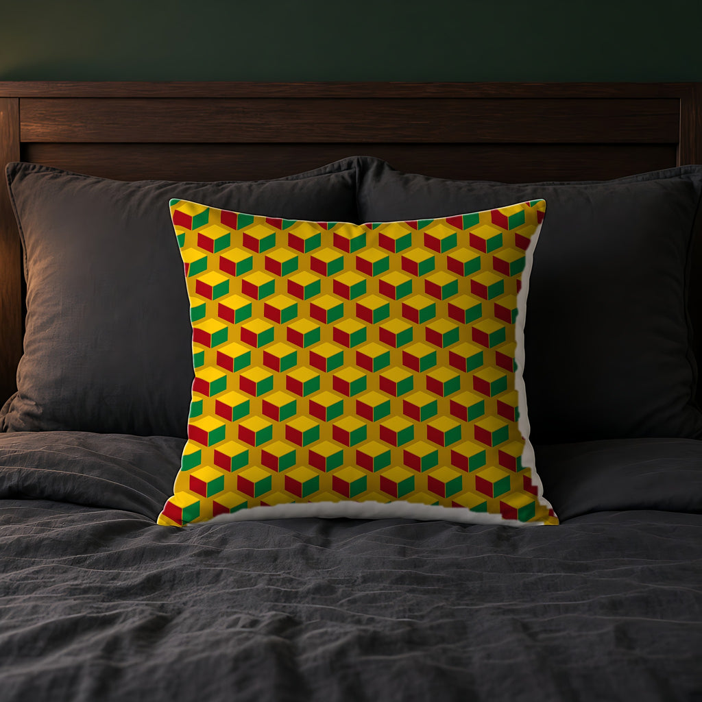 Giant Faceted Cubes II Faux Suede Cushion on a bed with charcoal bedding