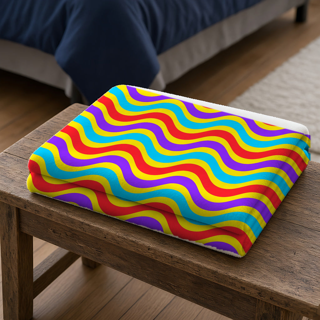 Wide Wave Interference Sherpa Fleece Blanket folded on a wooden bench
