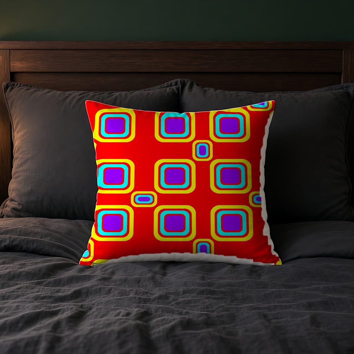 Big Ripple Squares Faux Suede Cushion on a bed with charcoal bedding