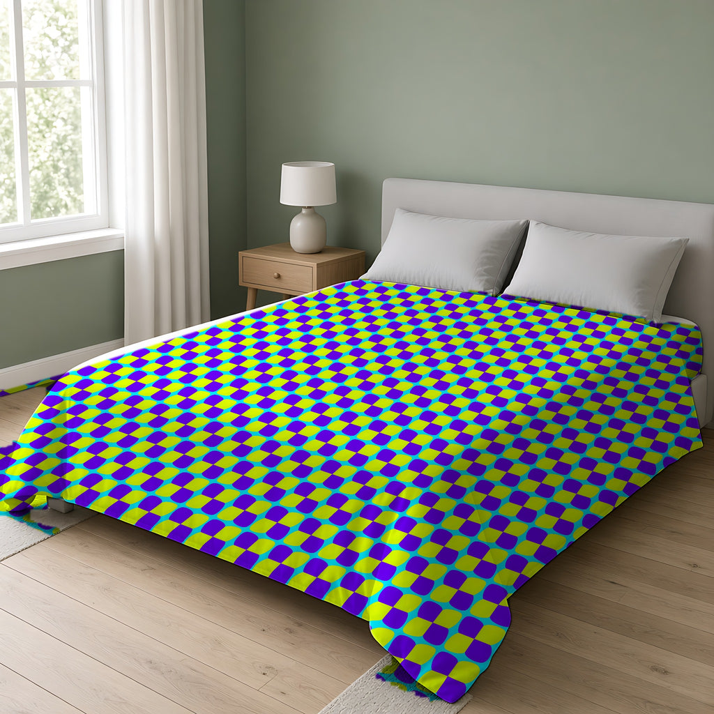 Bold Bulge Checker Comforter on a double bed in a bright sage-green bedroom