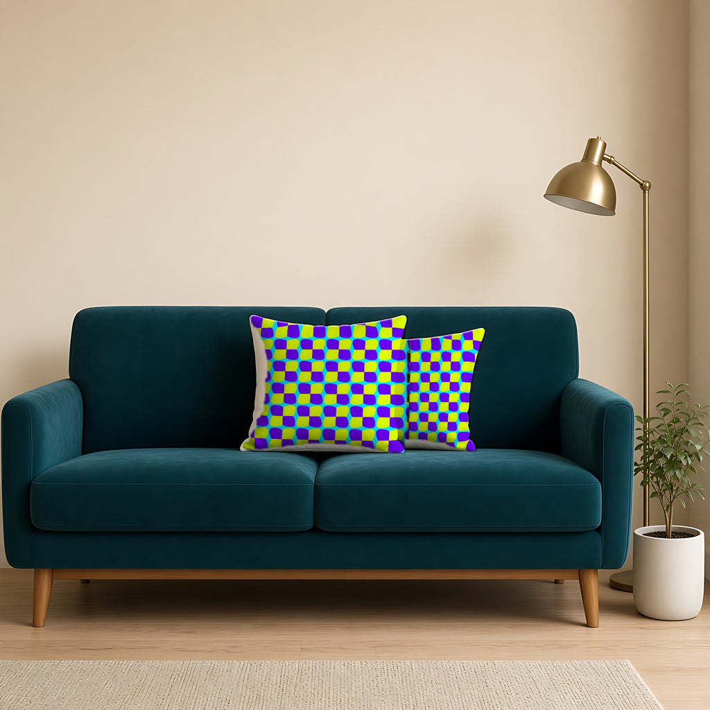 Bold Bulge Checker Faux Suede Cushion on a teal velvet sofa