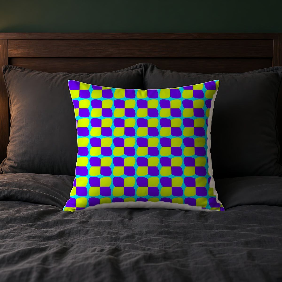 Bold Bulge Checker Faux Suede Cushion on a bed with charcoal bedding