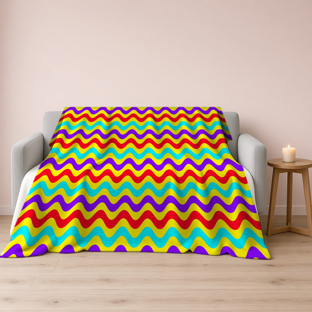Big Ripple Chevrons Sherpa Fleece Blanket draped over a grey sofa