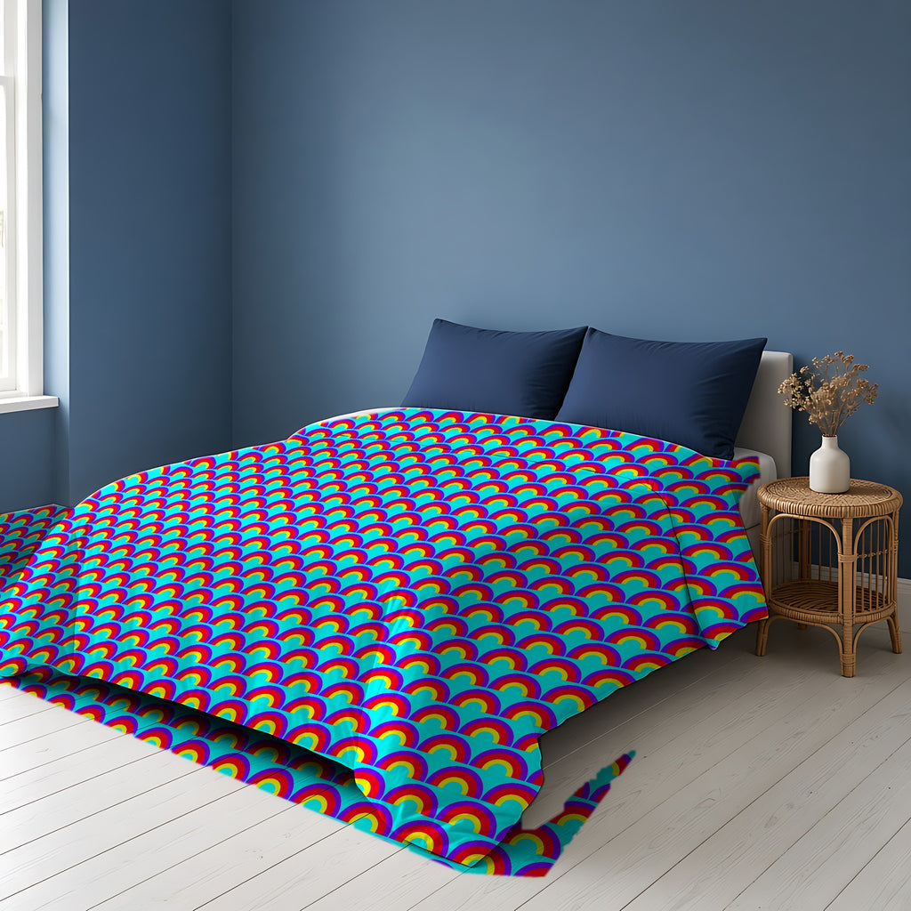 Chromatic Scallop Ripple Comforter on a bed in a Scandinavian blue bedroom
