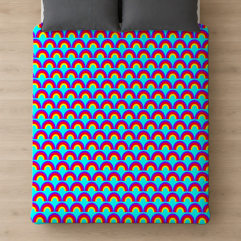 Chromatic Scallop Ripple Comforter on a bed, seen from above