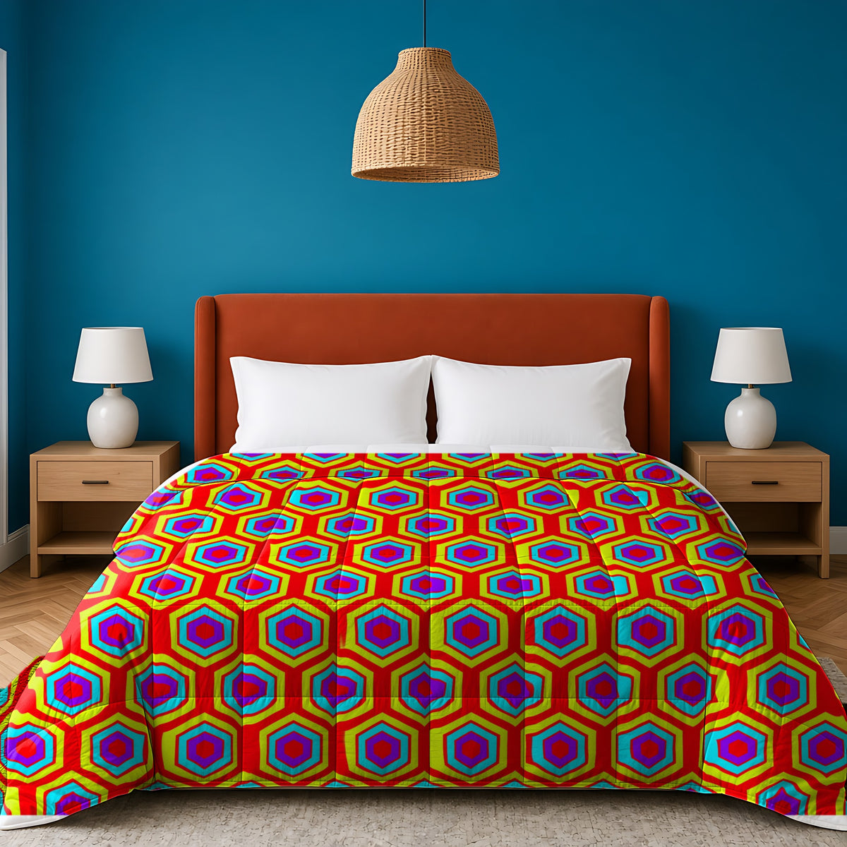 Concentric Hexagon Ripple comforter in the Chromatic Ripple palette, on a bed with a rust headboard against a teal wall