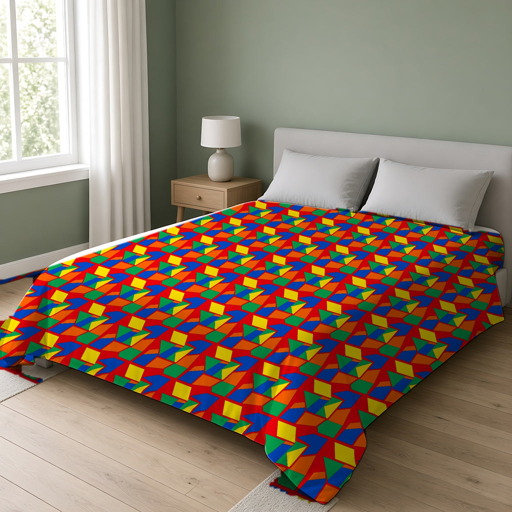 Cubist Block Quilt Comforter on a double bed in a bright sage-green bedroom