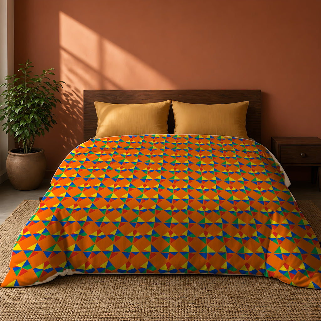 Stacked Cubist Prisms Comforter on a king bed against a warm terracotta wall