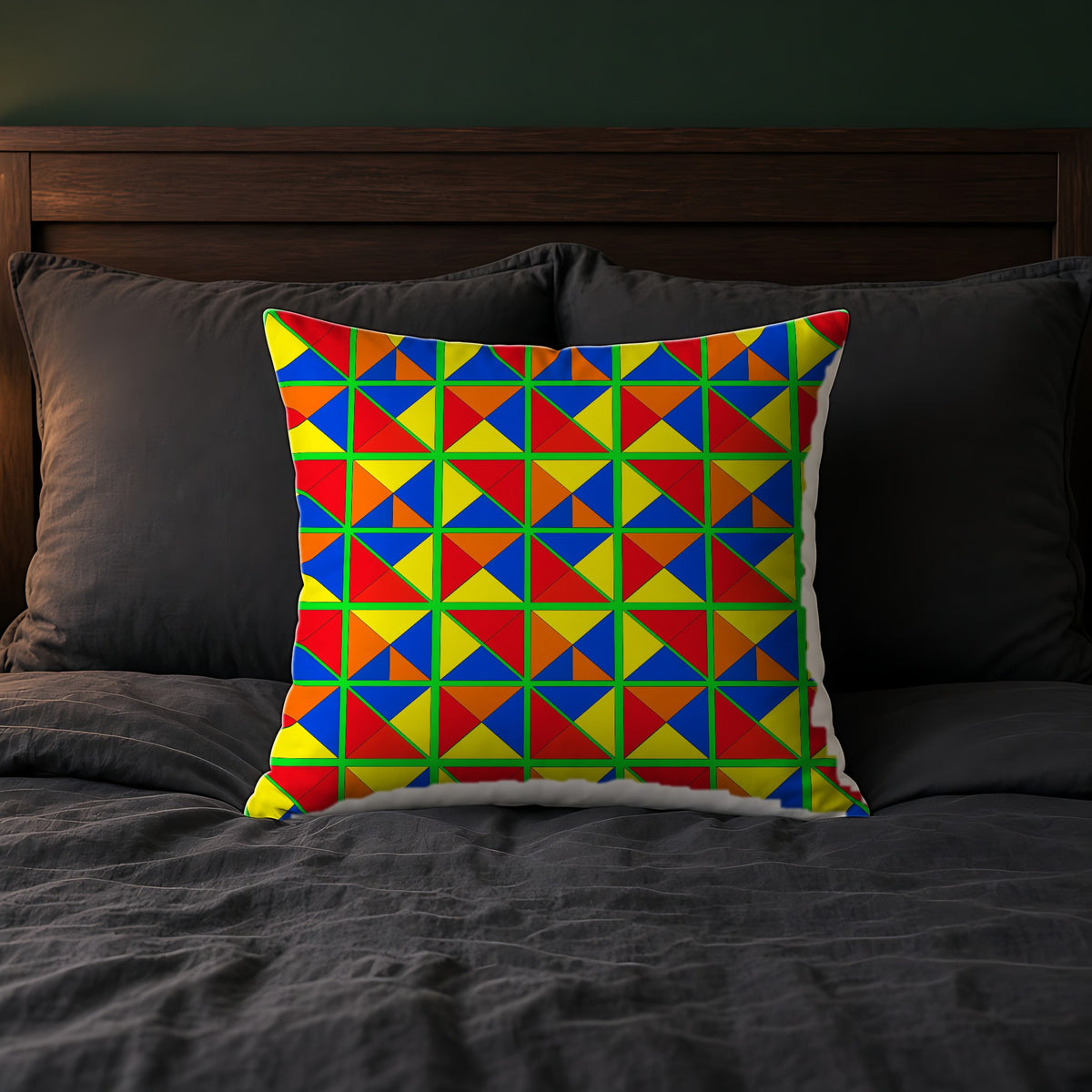 Split Square Fiesta Faux Suede Cushion on a bed with charcoal bedding
