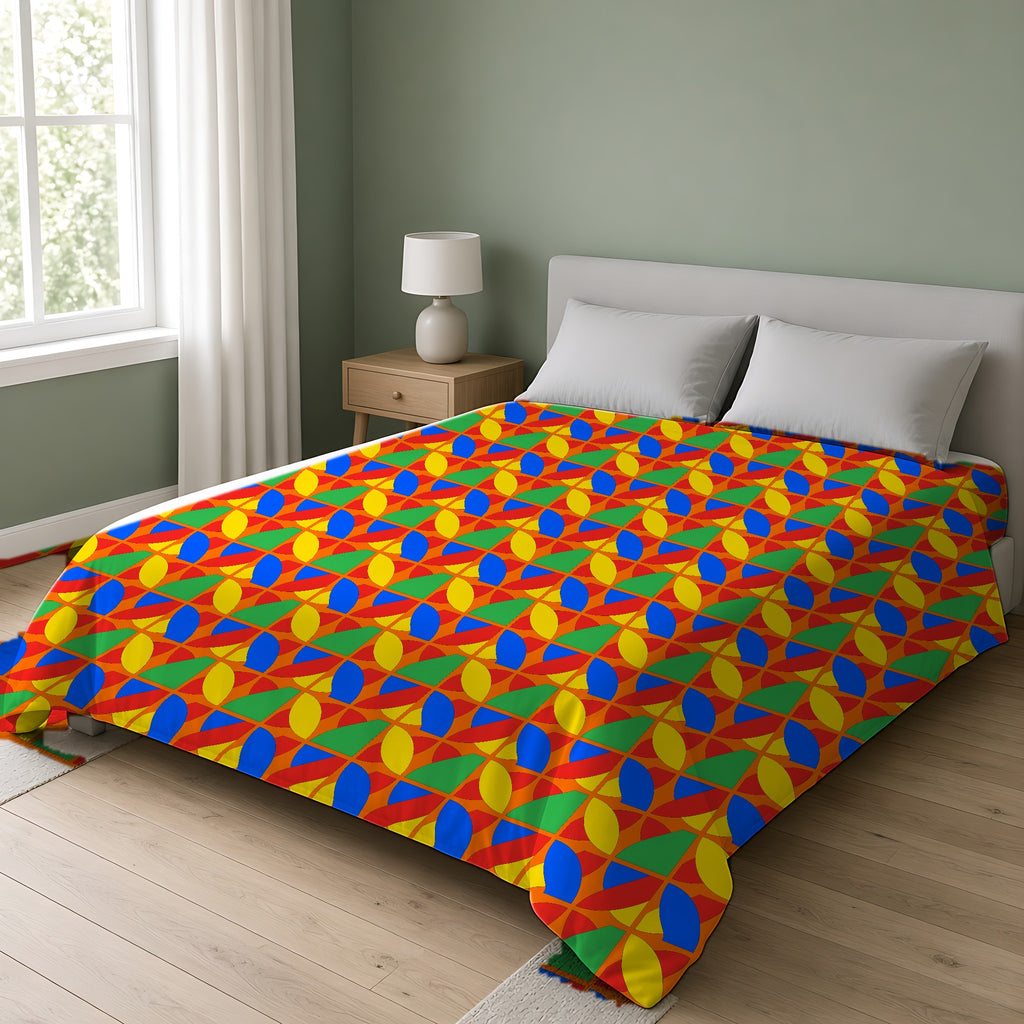 Cubist Arc Fragments Comforter on a double bed in a bright sage-green bedroom