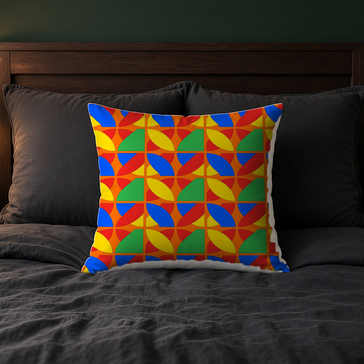 Cubist Arc Fragments Faux Suede Cushion on a bed with charcoal bedding