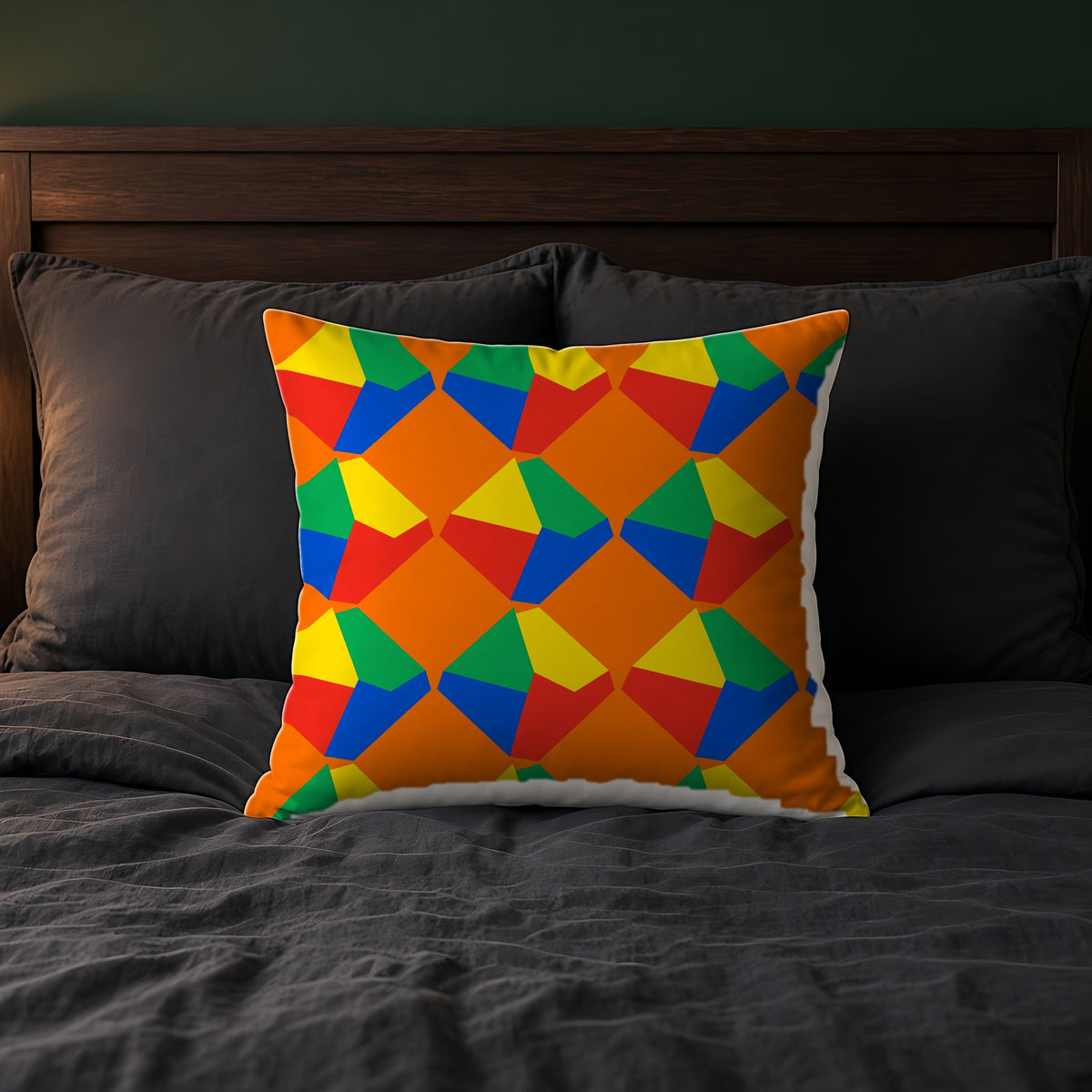 Grand Fractured Rhombus Faux Suede Cushion on a bed with charcoal bedding