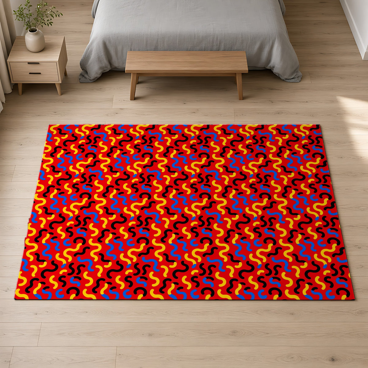 Squiggle Red Outdoor Rug on a pale oak floor in a calm bedroom