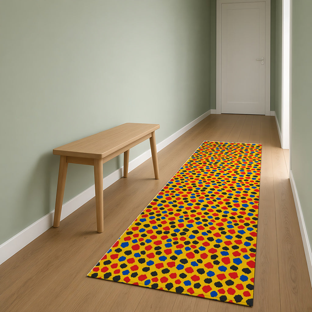 Confetti Scraps Yellow Outdoor Rug as a runner in a sage-green hallway