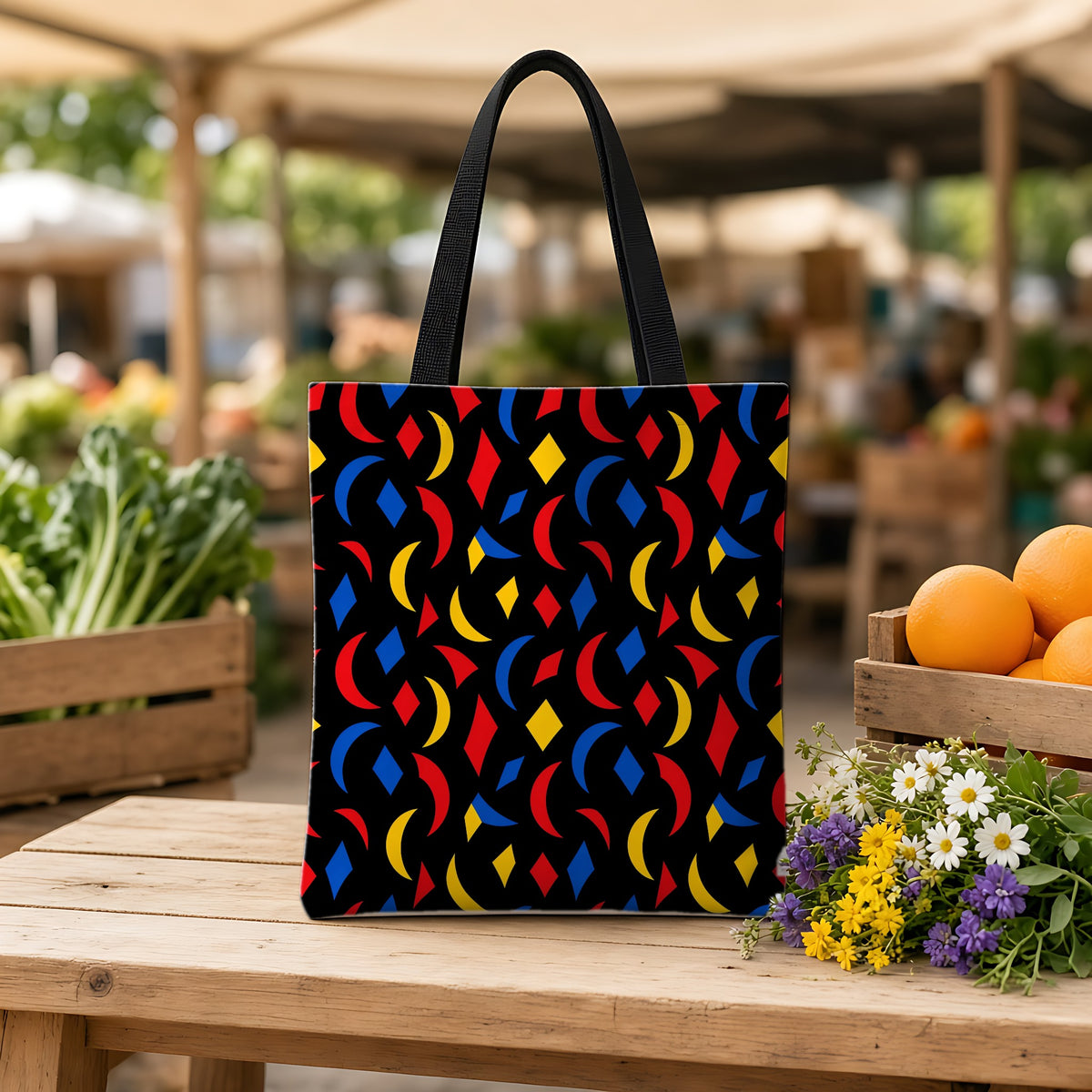 Crescent Scatter Weekender Tote Bag on a wooden bench at a farmers market