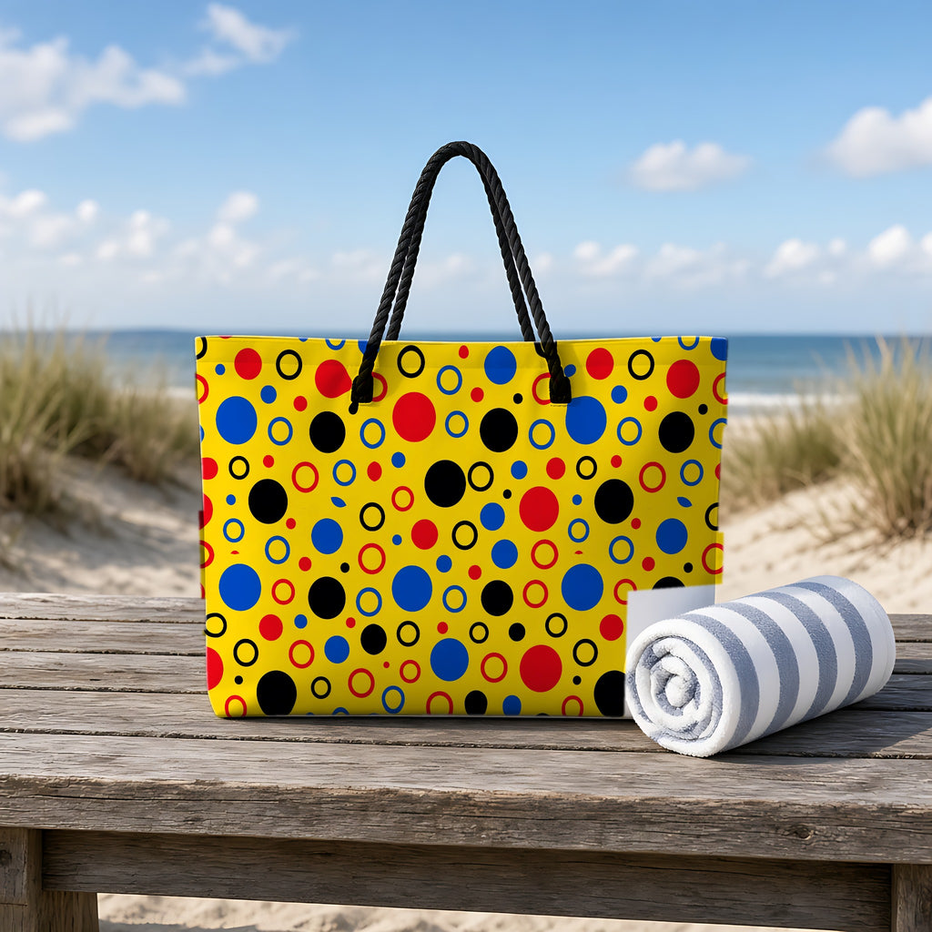 Bubble Outlines Weekender Tote Bag on a rustic table by the beach
