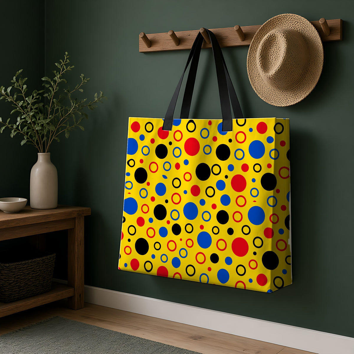 Bubble Outlines Weekender Tote Bag hanging on a peg rail in a green hallway