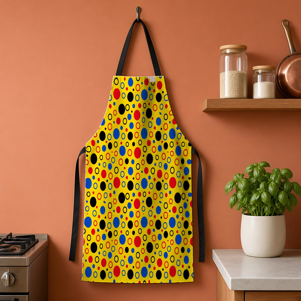 Bubble Outlines Apron hanging on a terracotta kitchen wall