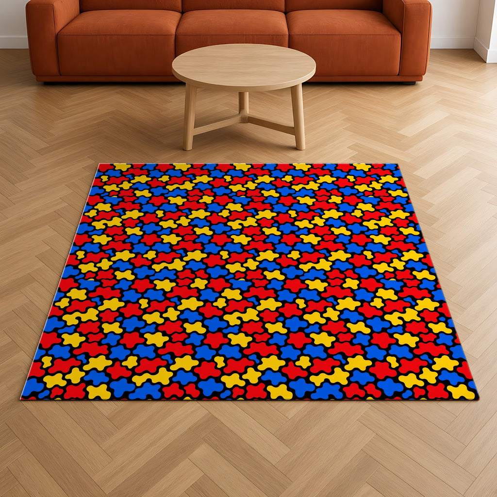 Blob Black Outdoor Rug on a herringbone wood floor in a living room