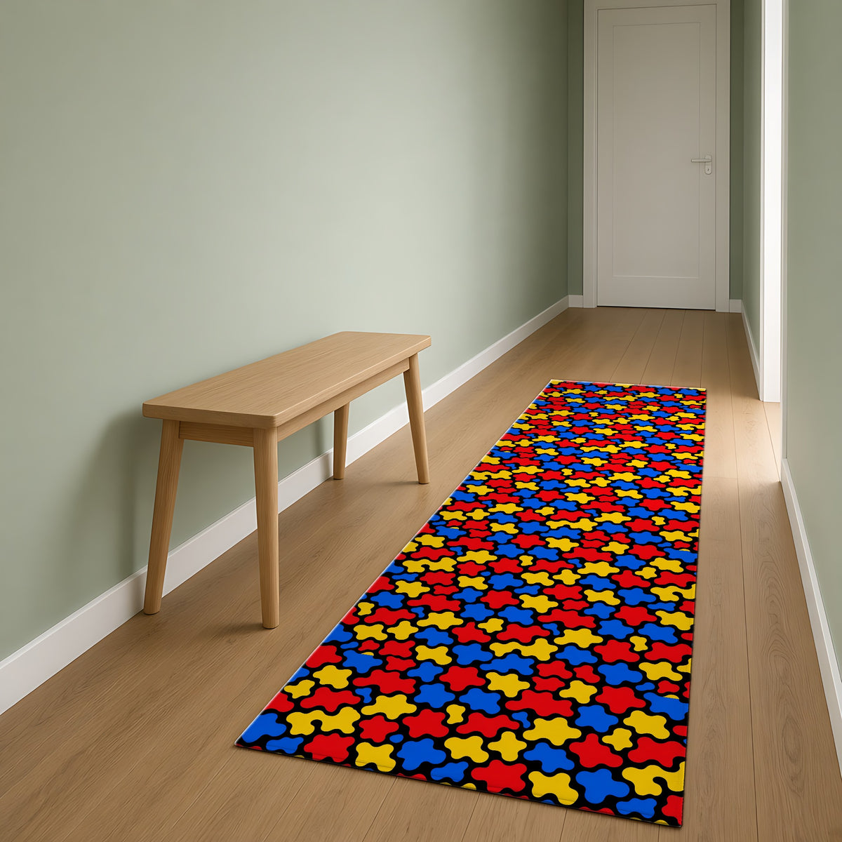 Blob Black Outdoor Rug as a runner in a sage-green hallway