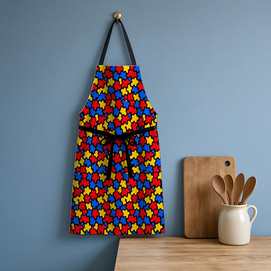 Blob Black Apron hanging in a blue kitchen