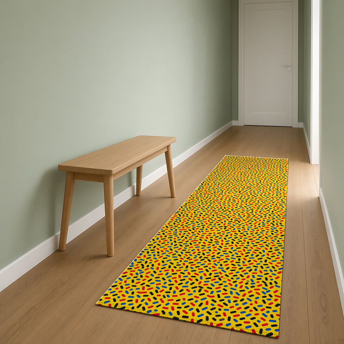 Sprinkle Pop Outdoor Rug as a runner in a sage-green hallway
