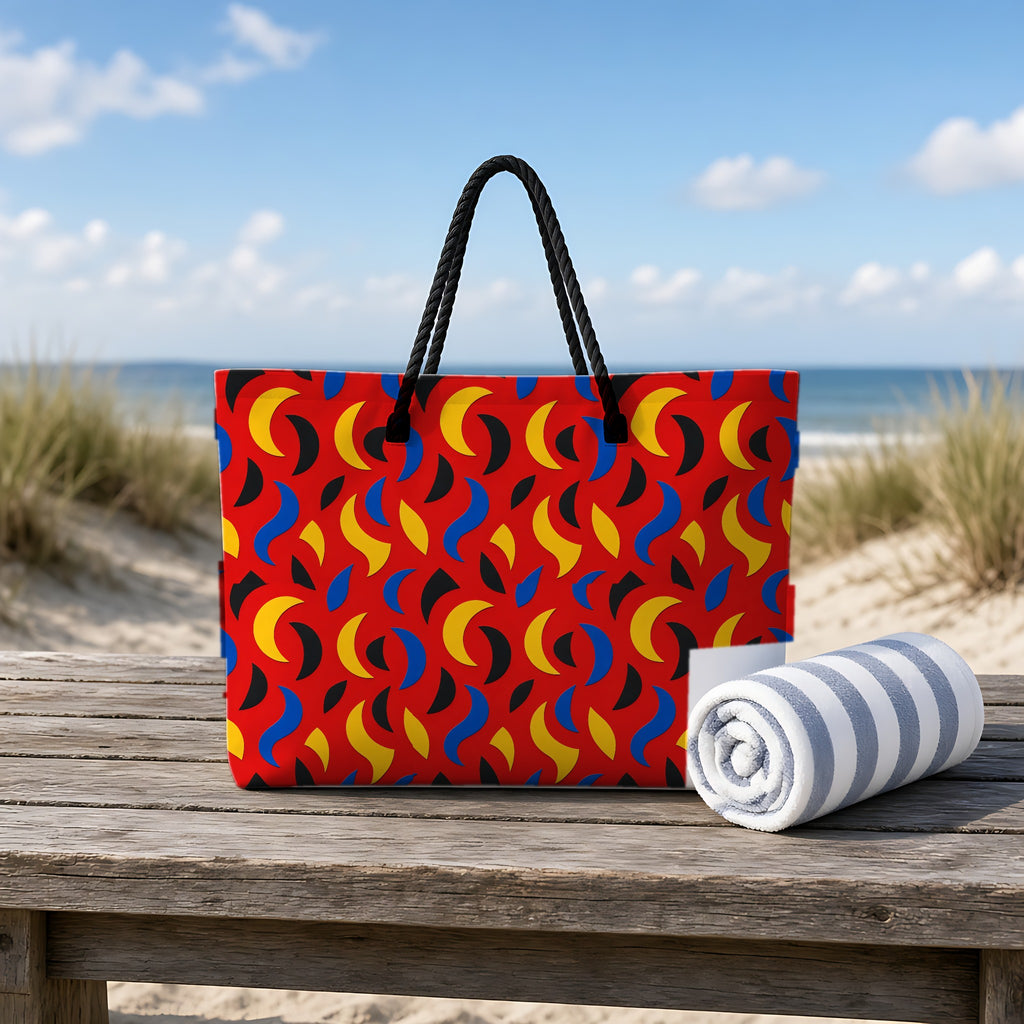 Swoosh Cutouts Weekender Tote Bag on a rustic table by the beach