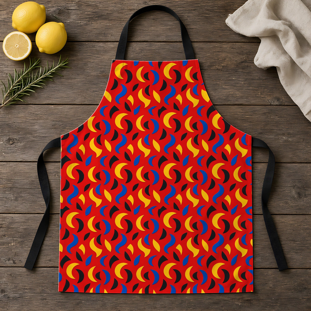 Swoosh Cutouts Apron laid flat on a rustic wooden table