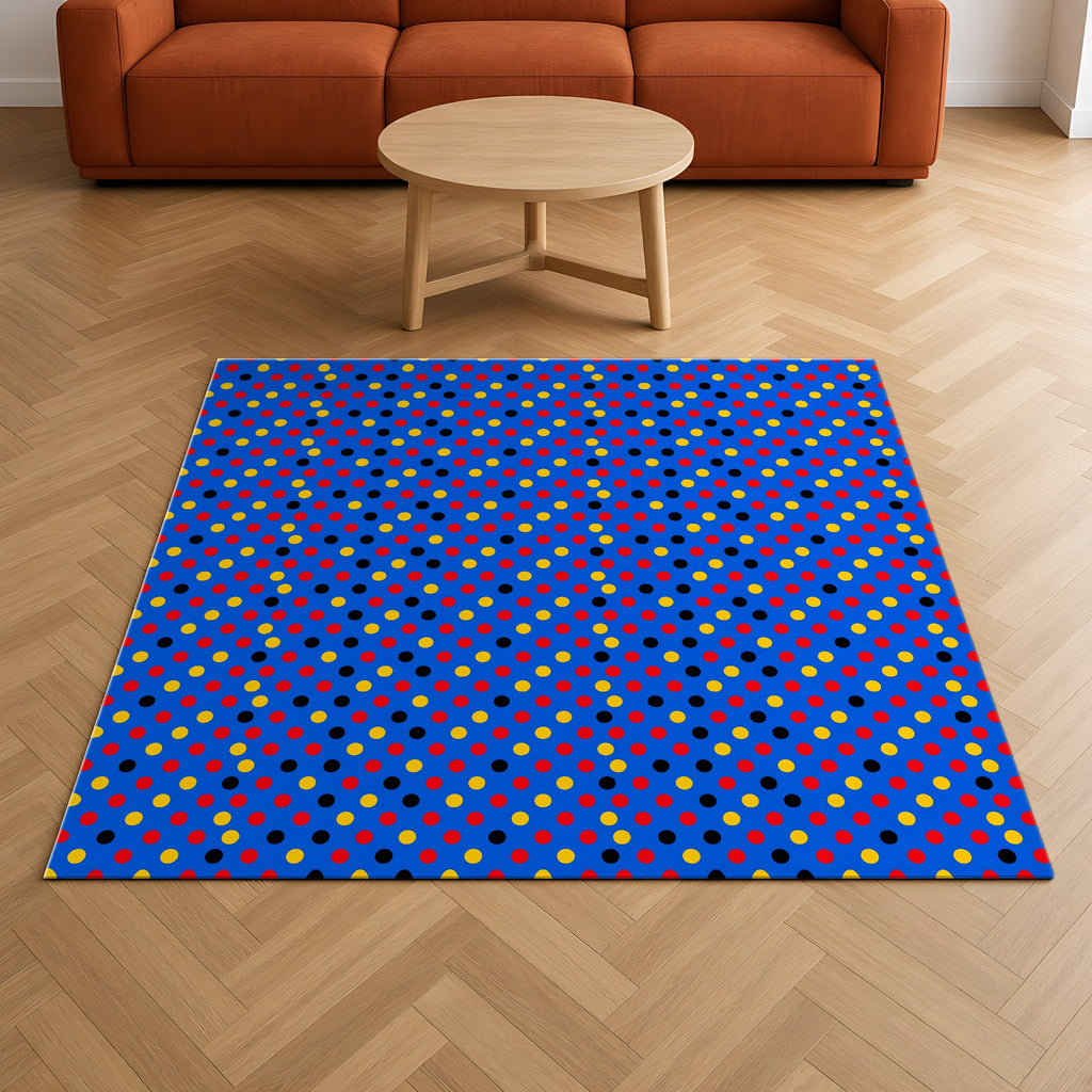 Dot Scatter Blue Outdoor Rug on a herringbone wood floor in a living room