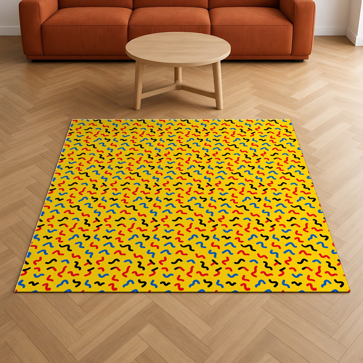 Squiggle Strokes Yellow Outdoor Rug on a herringbone wood floor in a living room