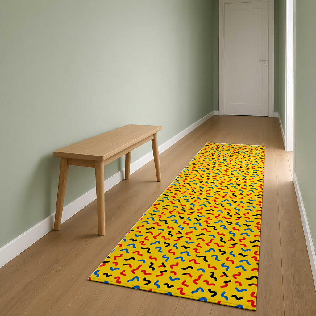 Squiggle Strokes Yellow Outdoor Rug as a runner in a sage-green hallway