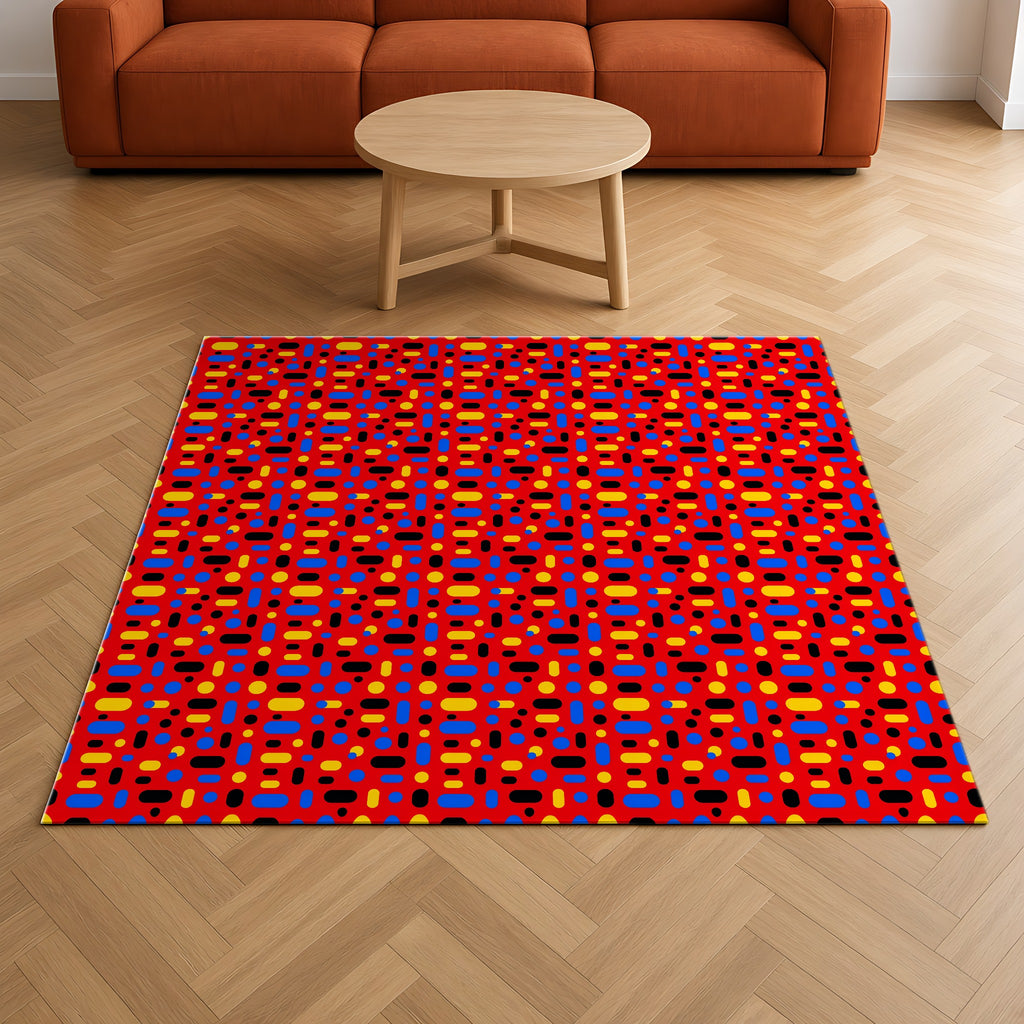 Confetti Dash Red Outdoor Rug on a herringbone wood floor in a living room