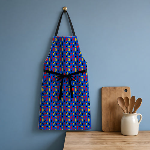 Bean Scatter Blue Apron hanging in a blue kitchen
