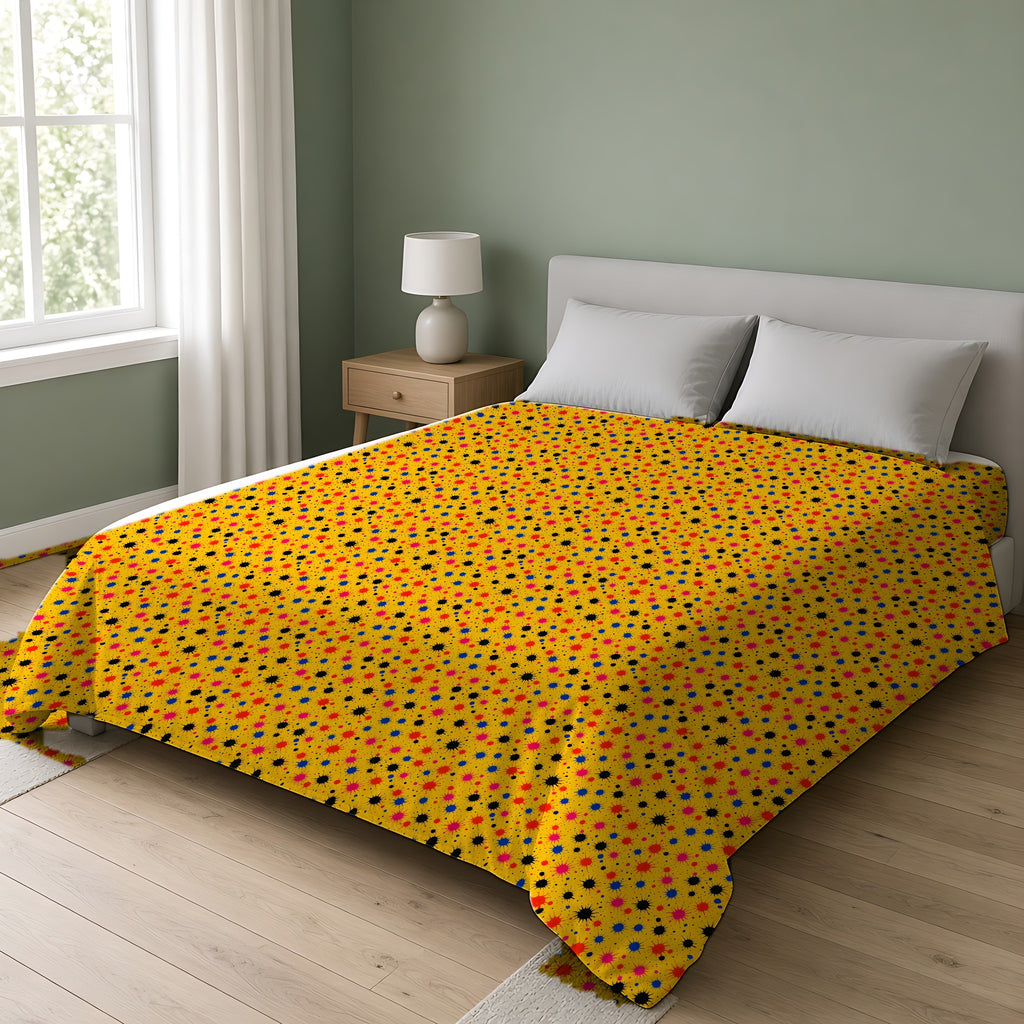 Saffron Splat Storm Cotton Duvet Cover on a double bed in a bright sage-green bedroom