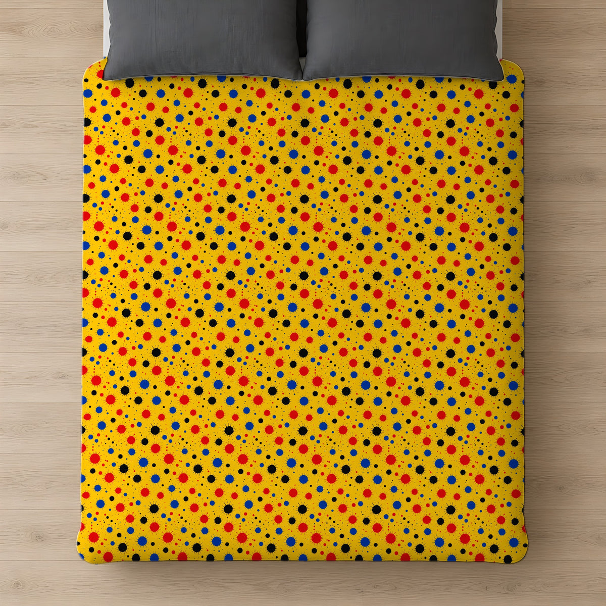 Blot Burst Cotton Duvet Cover on a bed, seen from above