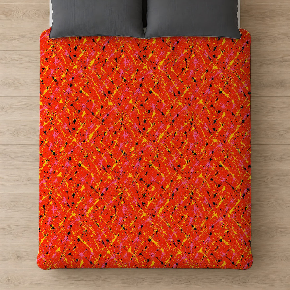 Vermilion Riot Cotton Duvet Cover on a bed, seen from above