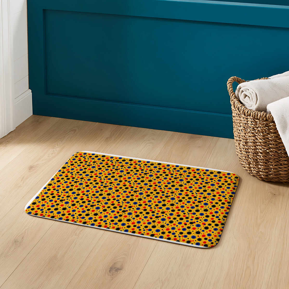 Wet Ink Pools Bath Mat on an oak floor in a teal bathroom