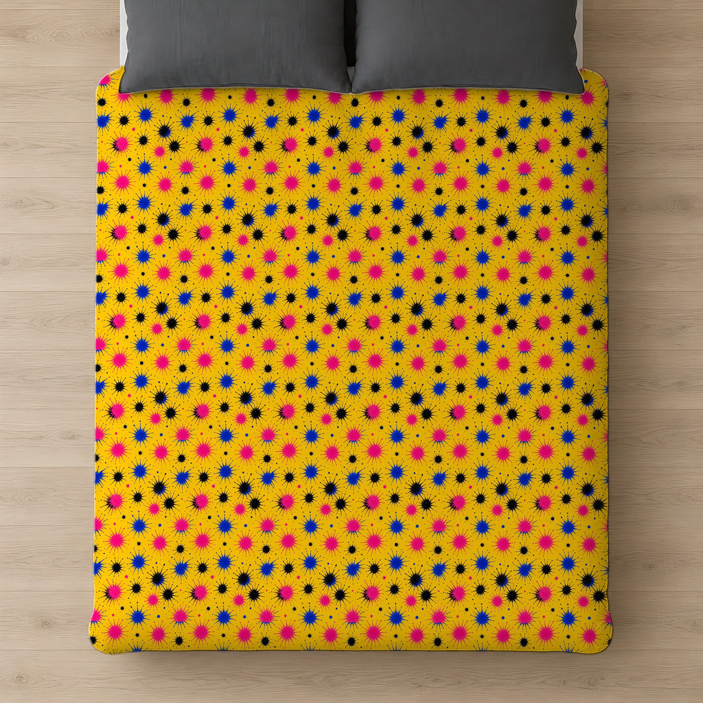 Splash Crowns Cotton Duvet Cover on a bed, seen from above
